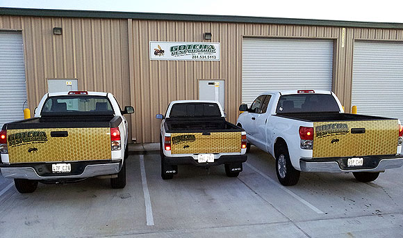 Gotcha Pest Control's Richmond, TX office and branded service trucks